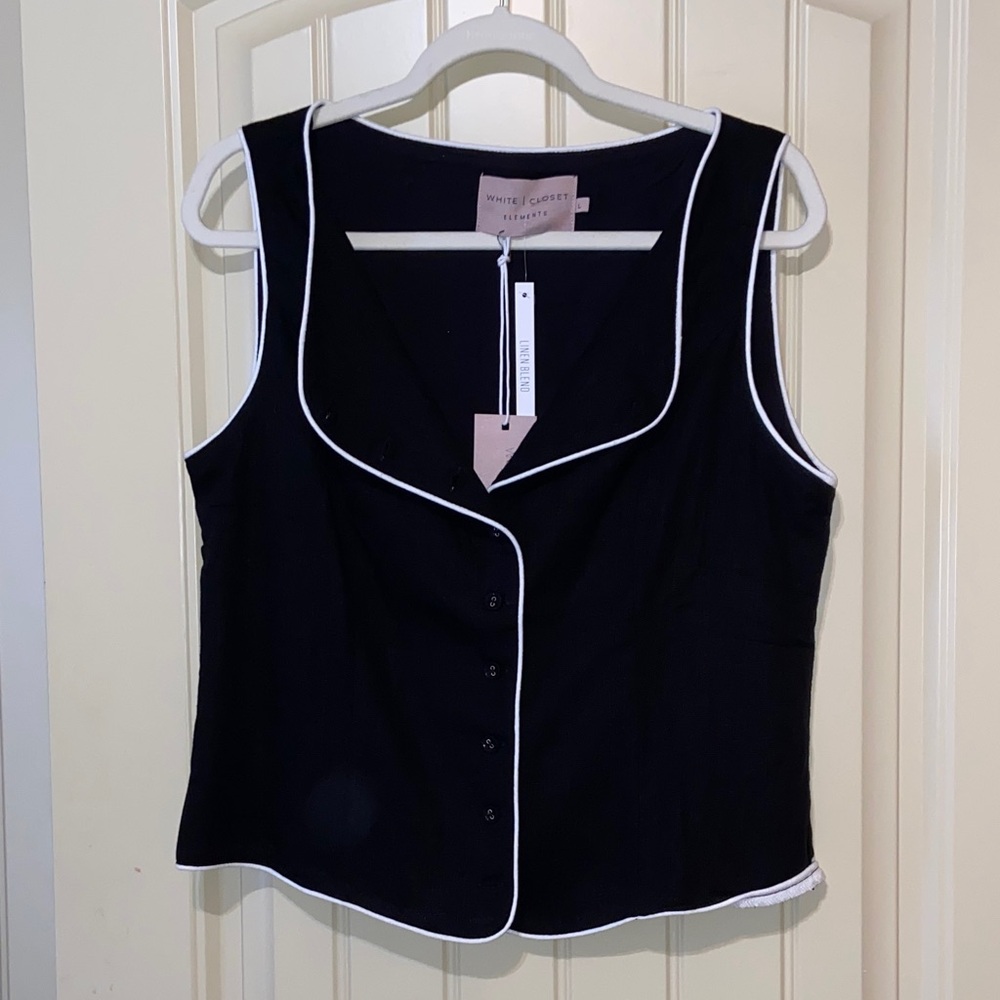 Sophisticated Black Sleeveless Vest with White Trim